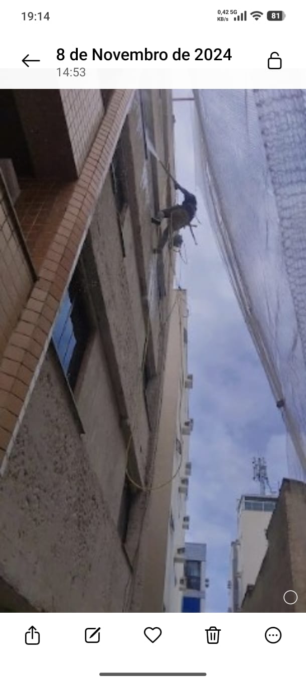 Pintura de balancinho em fachada de prédio em Vitória ES